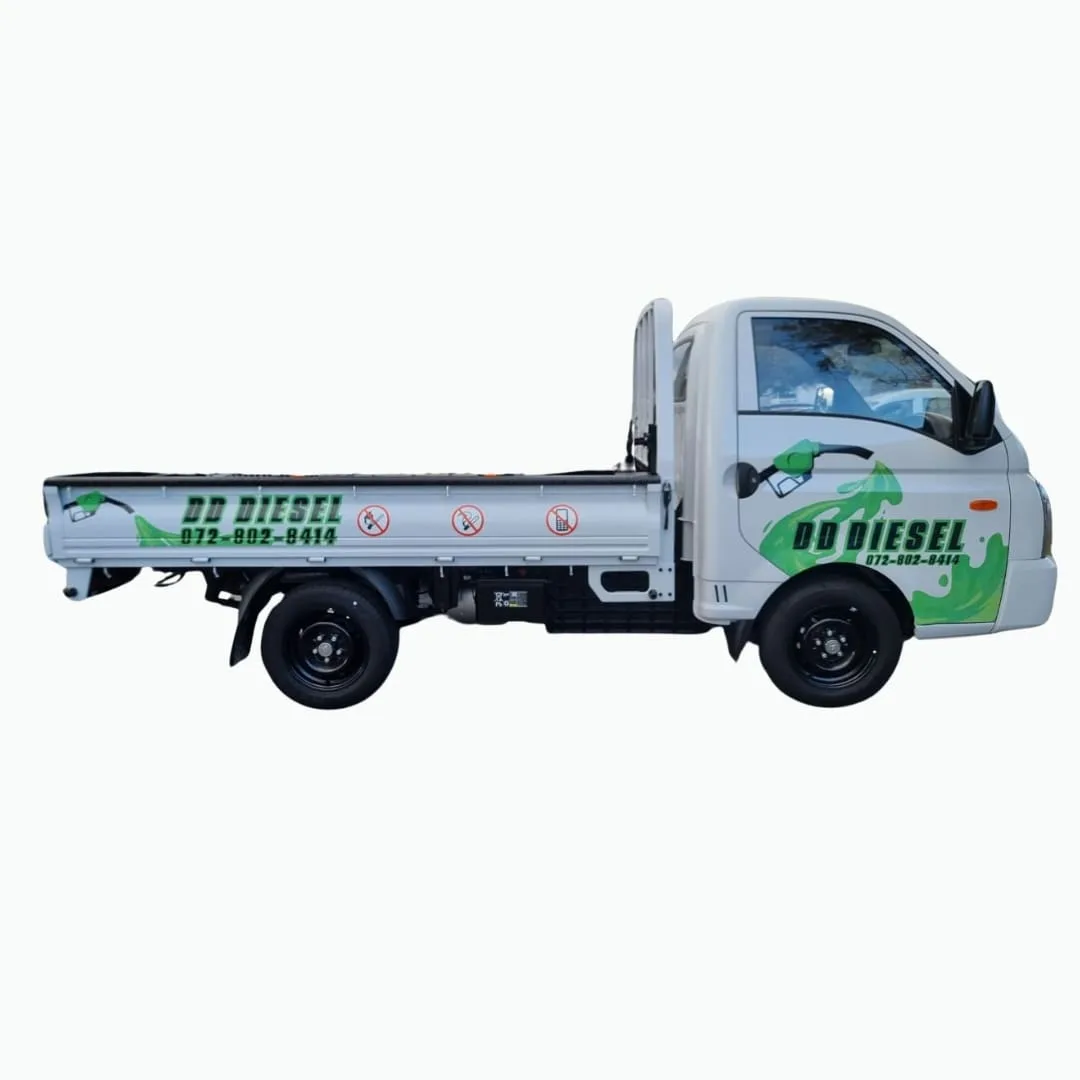 Light delivery truck branded with printed cab door decals
