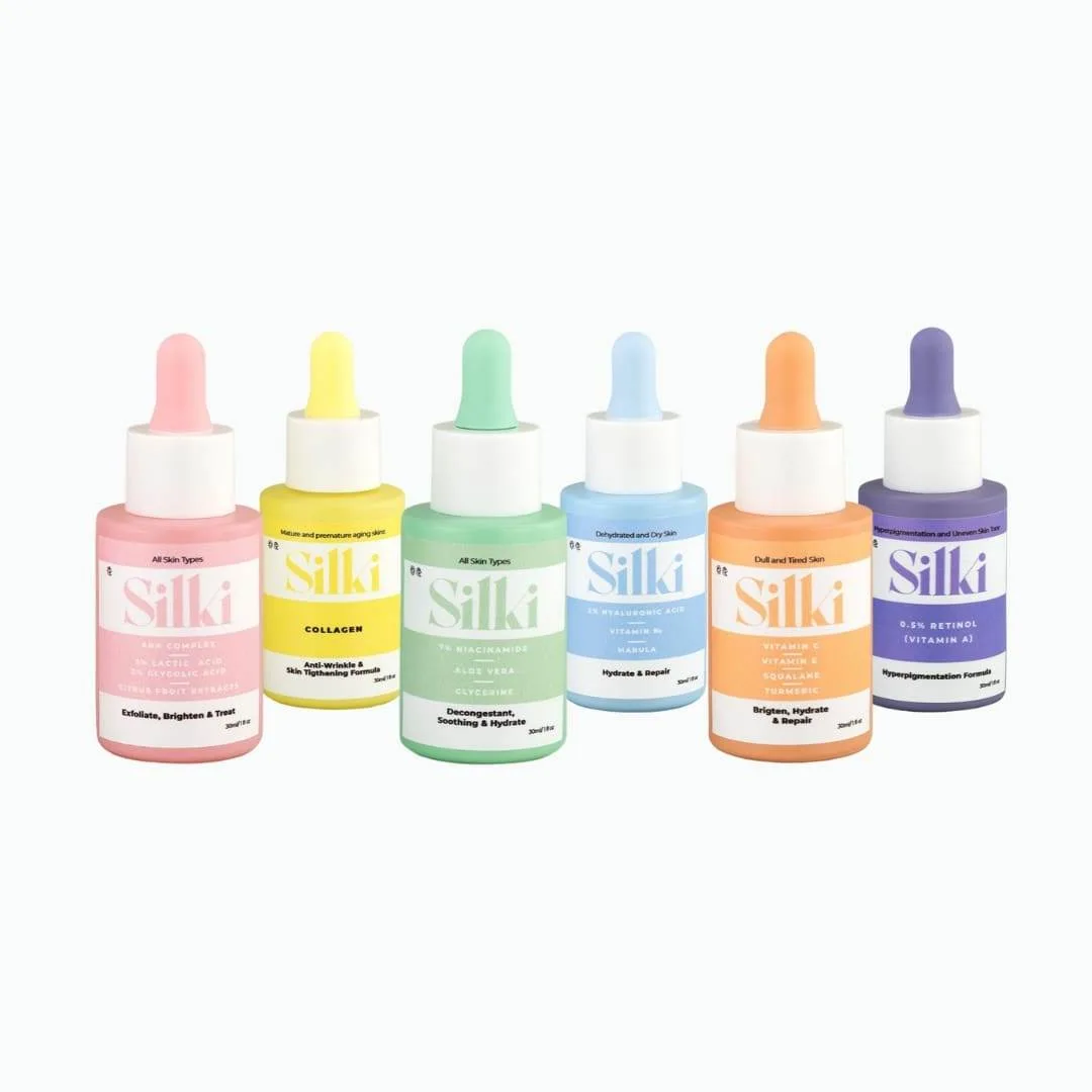 Row of dropper bottles with custom printed cosmetic product labels