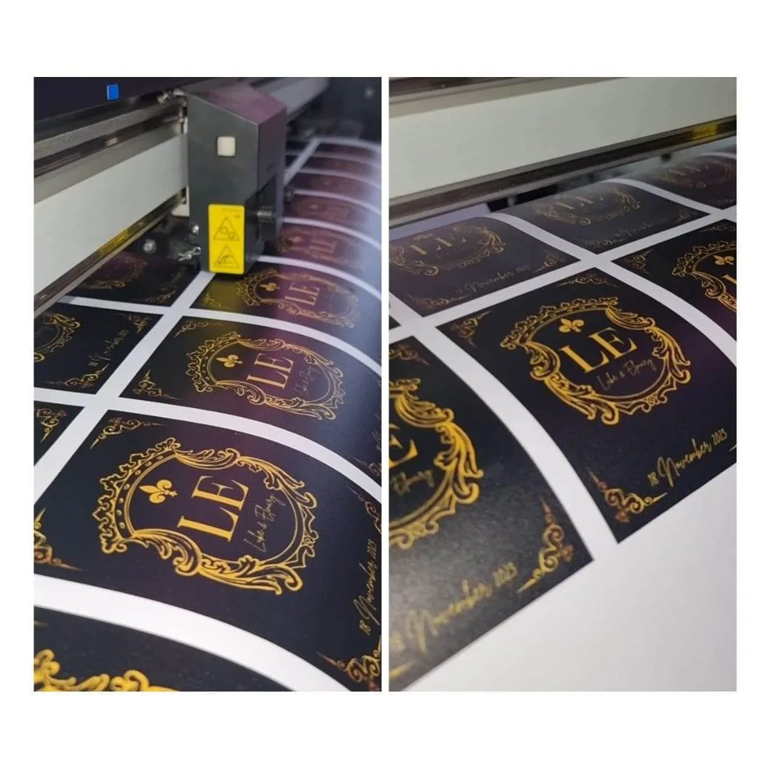 Custom stickers being printed and cut in production