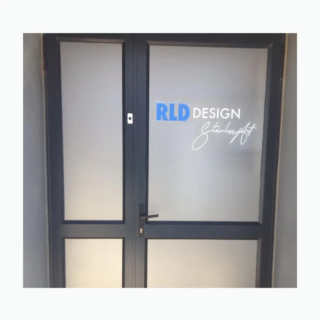 Glass office doors in frosted vinyl with a printed company logo