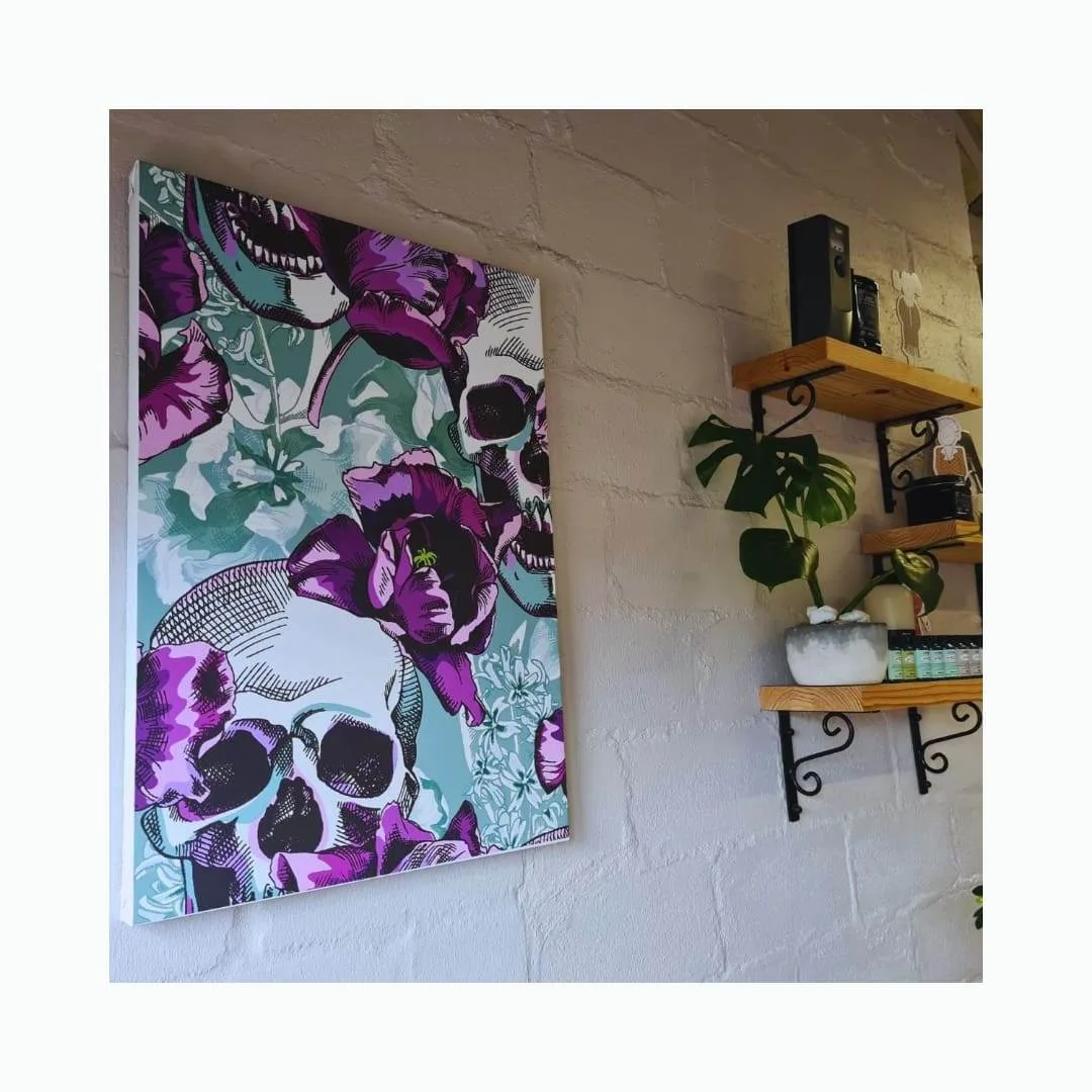Large floral art canvas print displayed in an interior