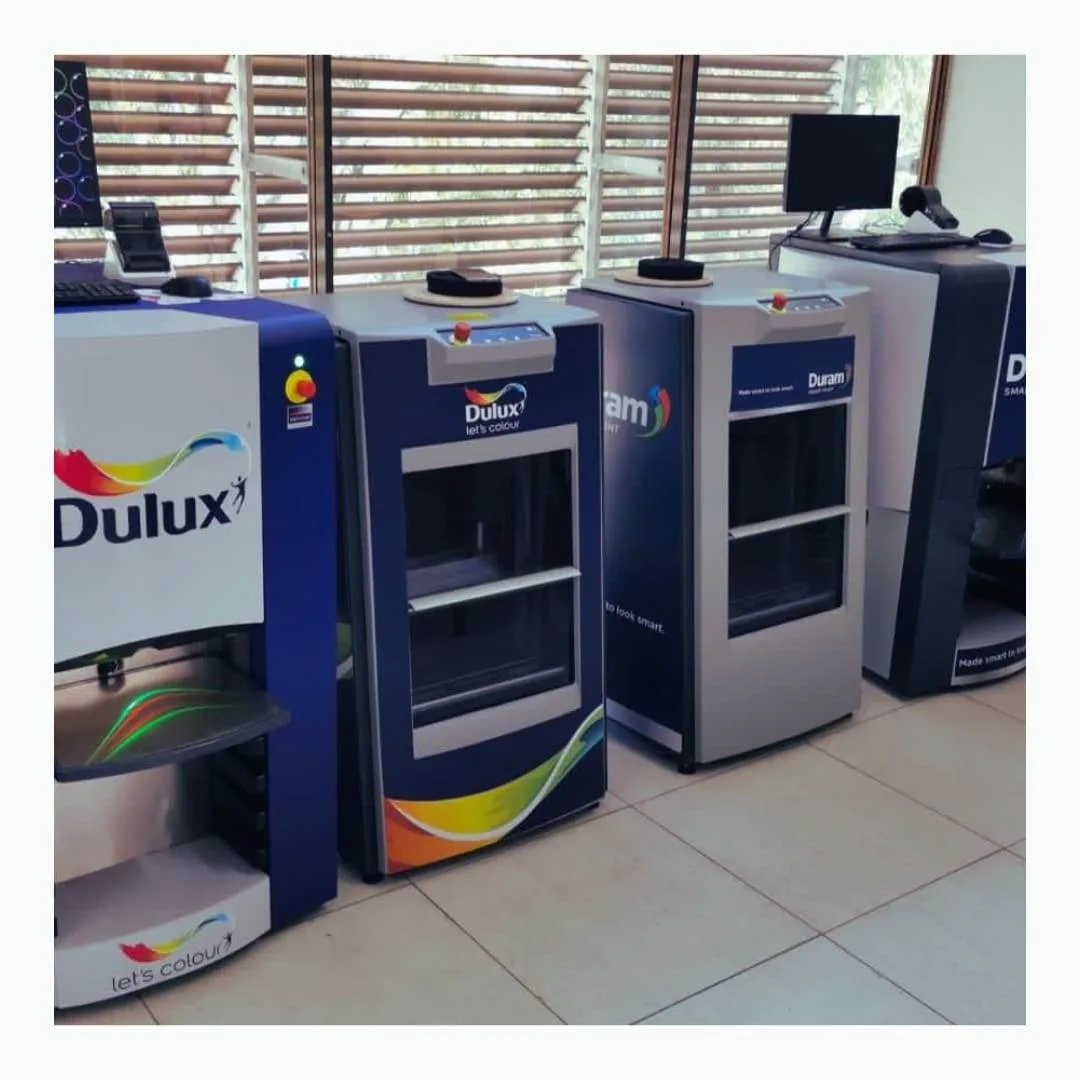 Row of in-store machines finished in matching branded decals