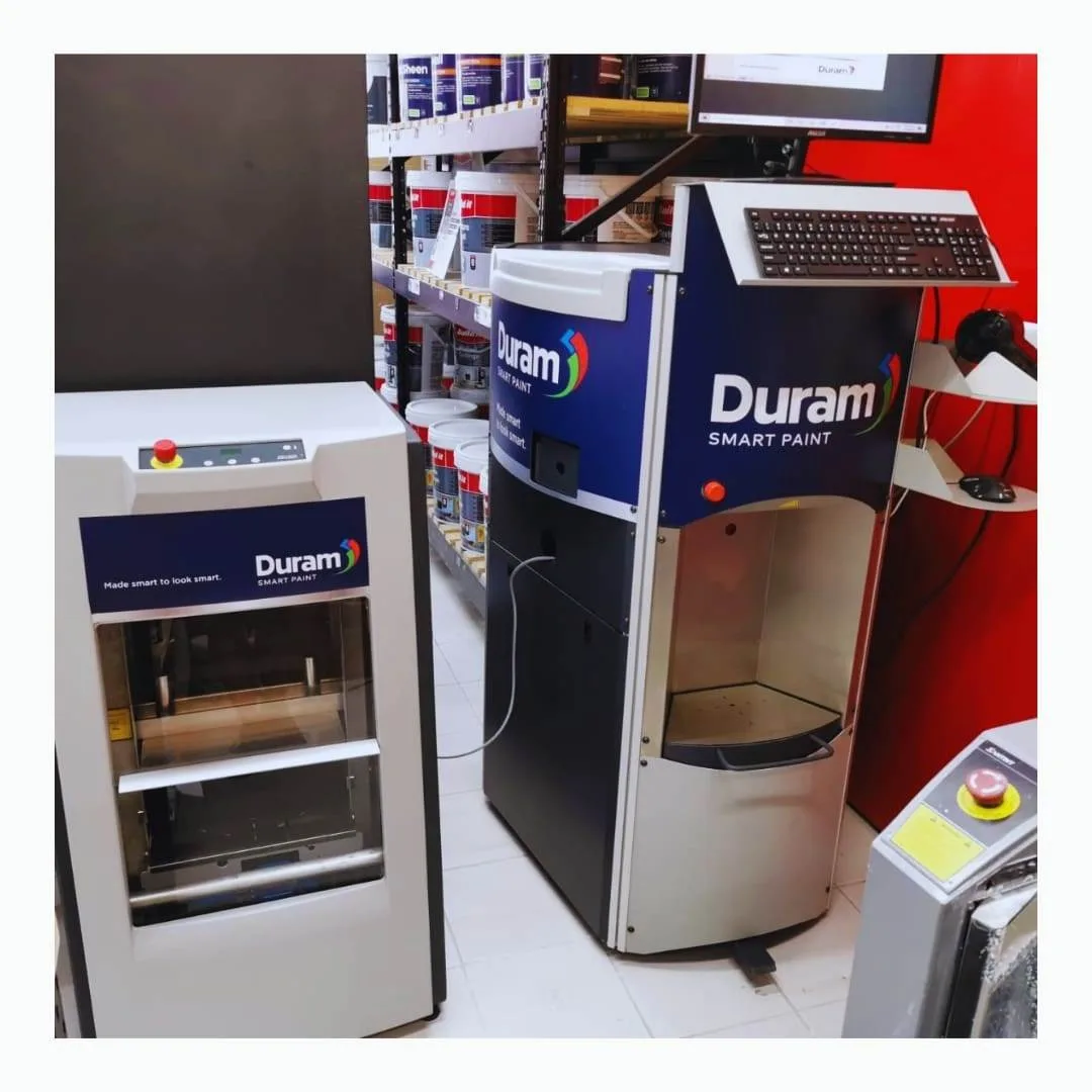 Retail paint mixing machines wrapped in custom printed brand decals