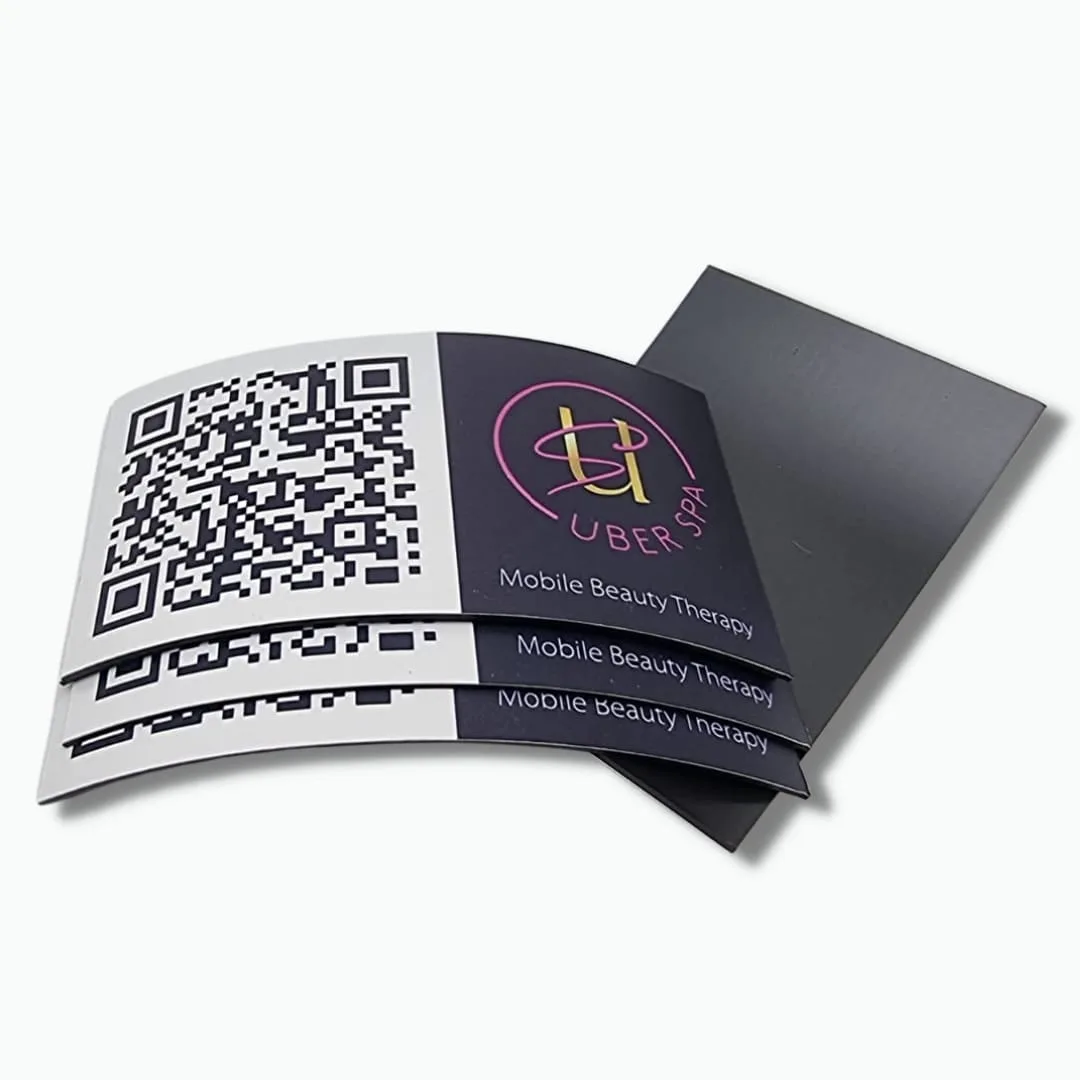 Small custom printed magnets with a QR code and logo