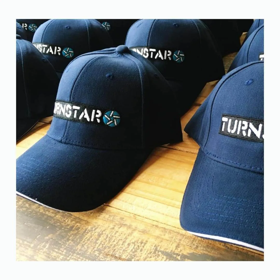 Navy branded caps with an embroidered logo
