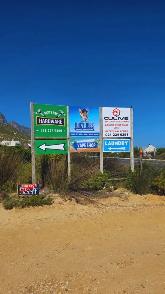 Branded signage at a coastal pitstop shop