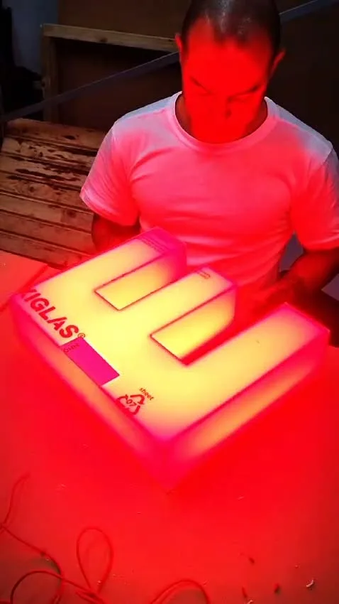 Illuminated red acrylic letters built for ECP Security