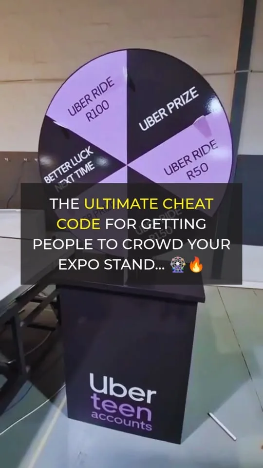 Branded prize wheel on an expo stand